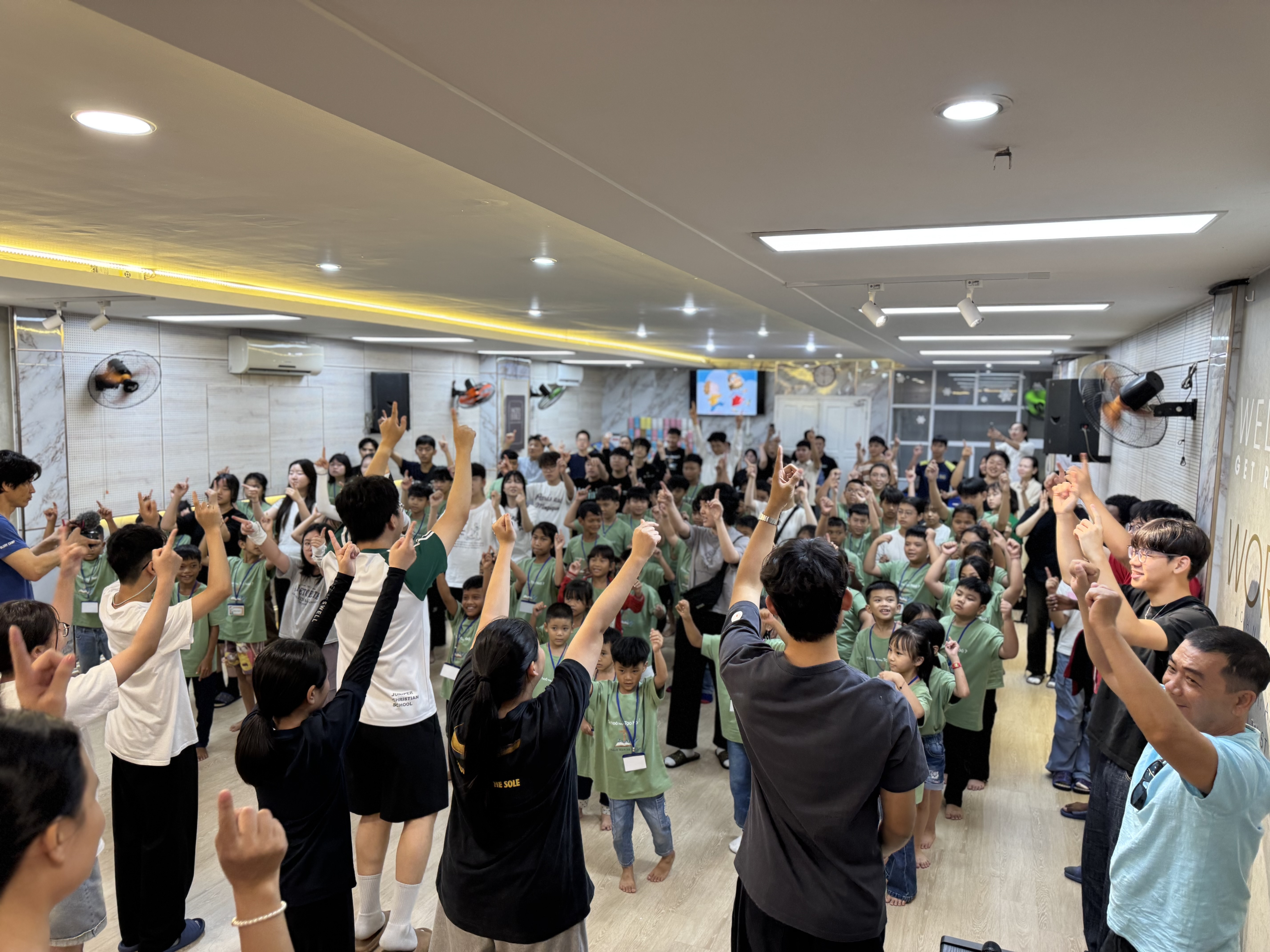 Mission Trip & Community Service in the Spiritual Programs Students interacting with children overseas during a Mission Trip & Community Service as part of the Extracurricular activities.